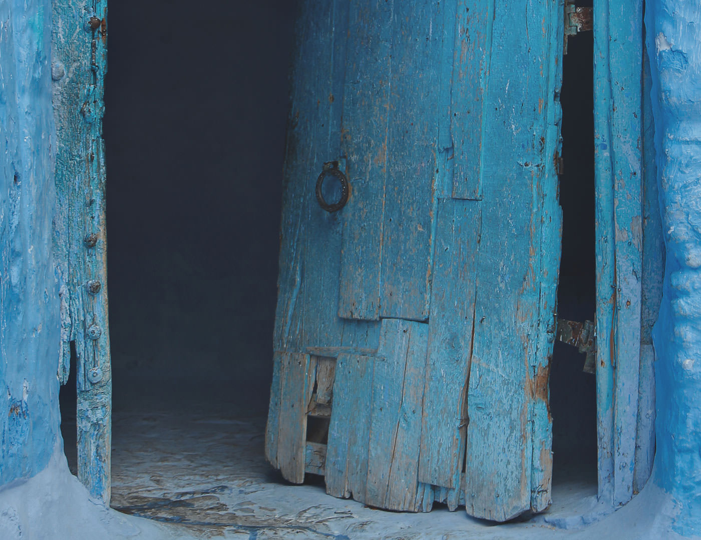 Broken blue door